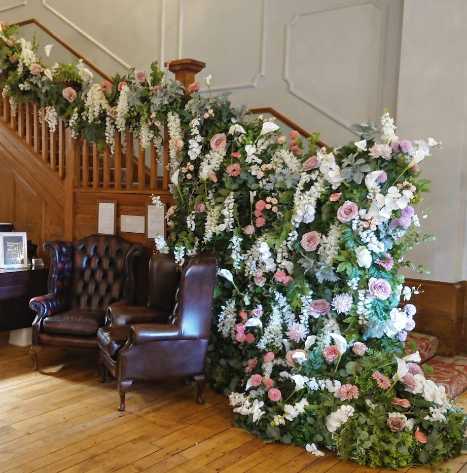 A full length floral staircase design consisting of beautiful decor